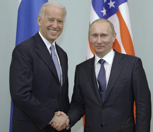 AP ©<br> Премьер-министр РФ Владимир Путин на встрече с вице-президентом США Джозефом Байденом