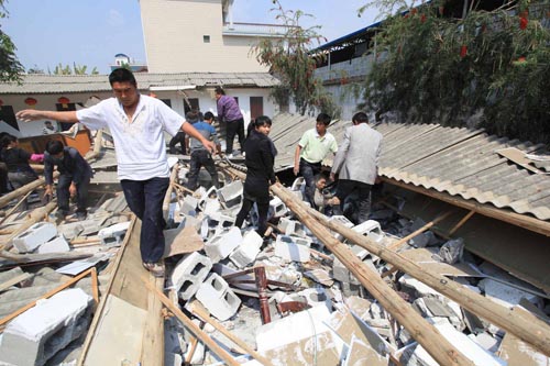 AP ©<br> Последствия землетрясения в китайской провинции Юньнань