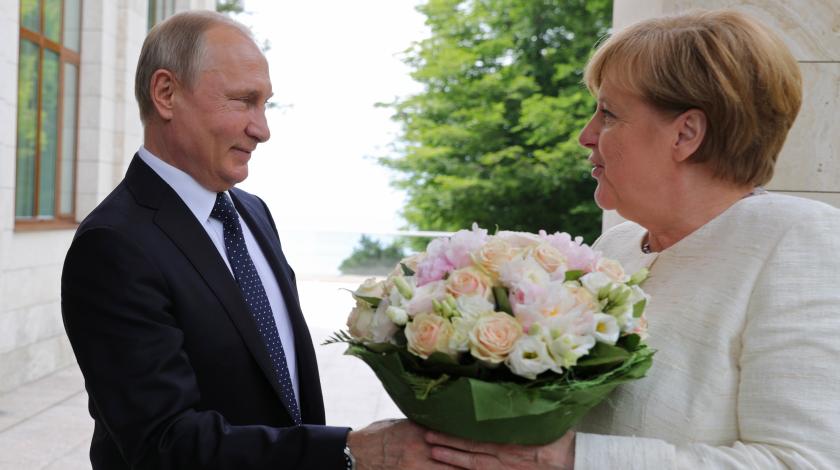 Цветы Путина покорили Меркель