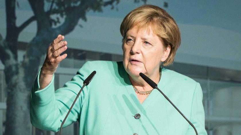 Меркель после подписания "формулы Штайнмайера" высказалась о снятии санкций